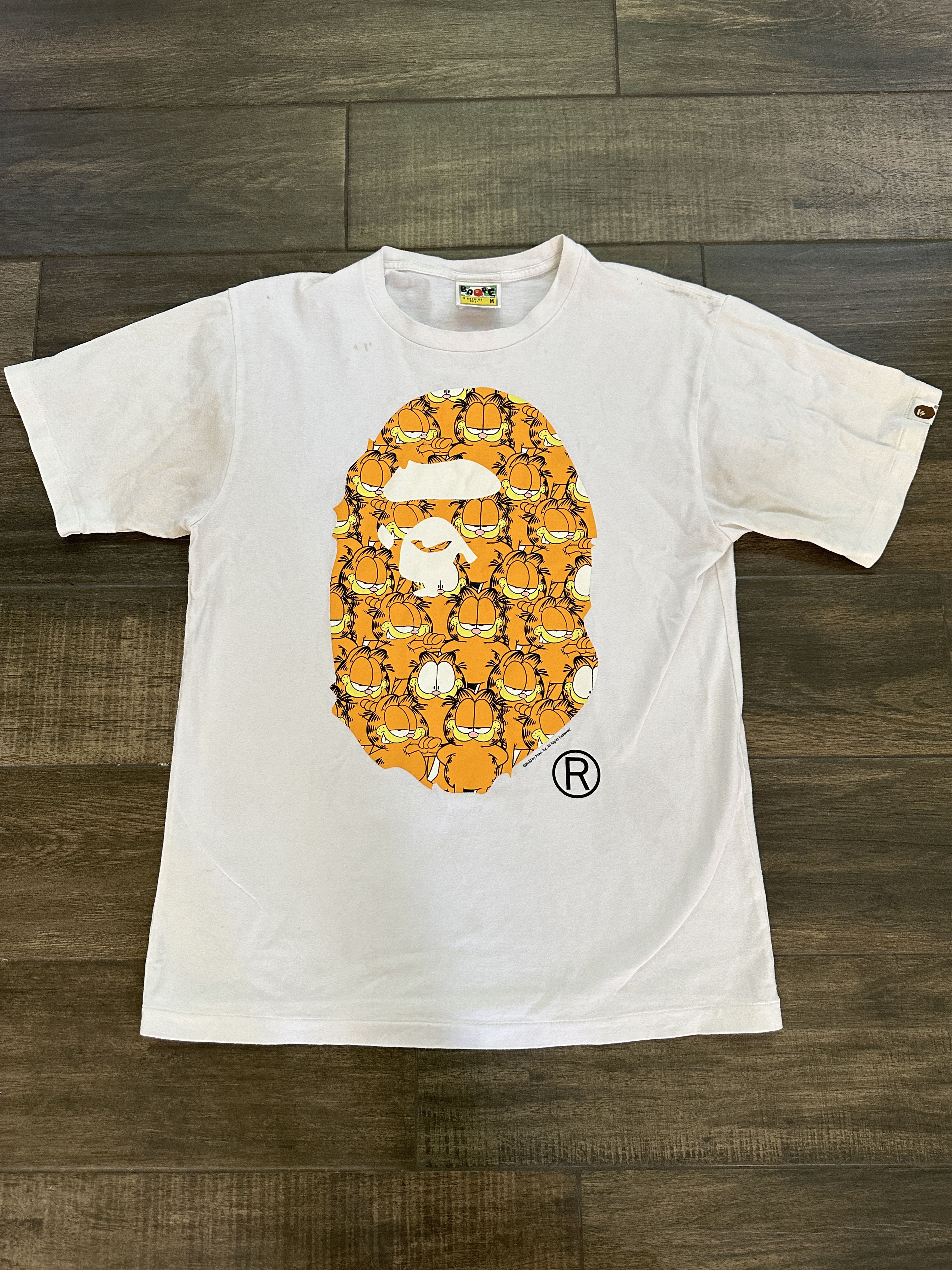 image of Bape Garfield Ape Head Logo Tee in White, Men's (Size Medium)