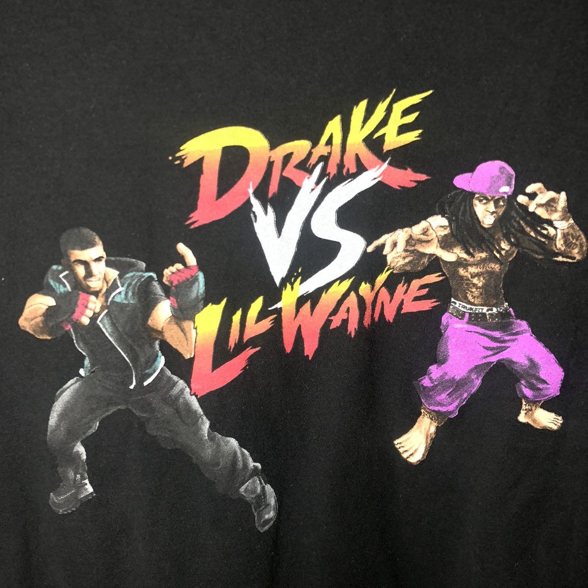 Drake × Lil Wayne × Rap Tees DRAKE VS LIL WAYNE 2014 TOUR CAPCOM MERCHANDISE Size US M / EU 48-50 / 2 - 5 Thumbnail
