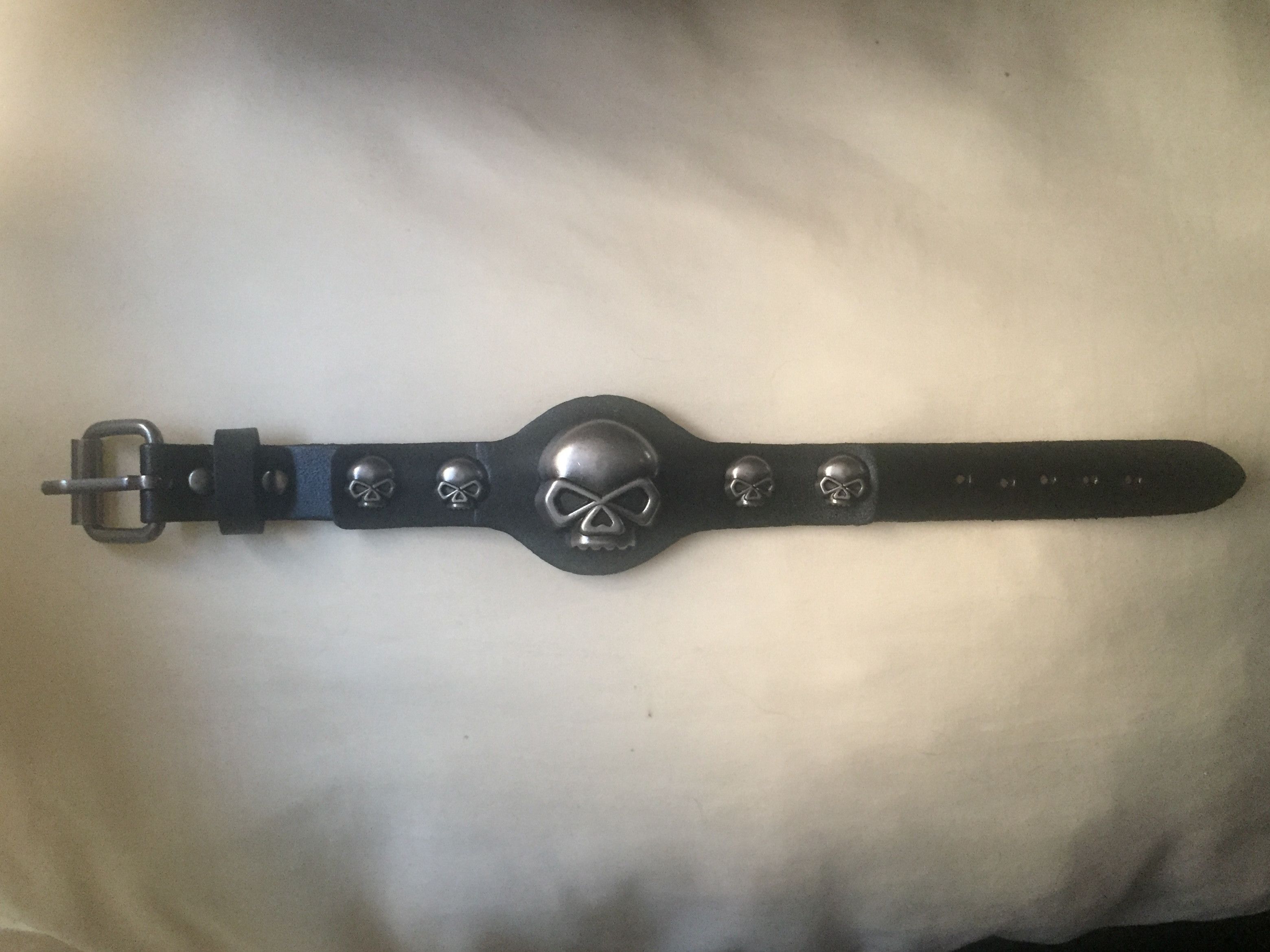 Jewelry 5 Skulls Black Leather Band Bracelet Size ONE SIZE - 1 Thumbnail
