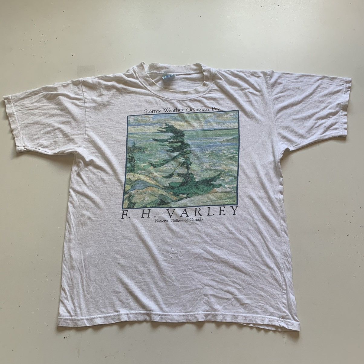 image of Vintage Y2K 90's F H Varley Art Graphic T Shirt Canada in White, Men's (Size Large)