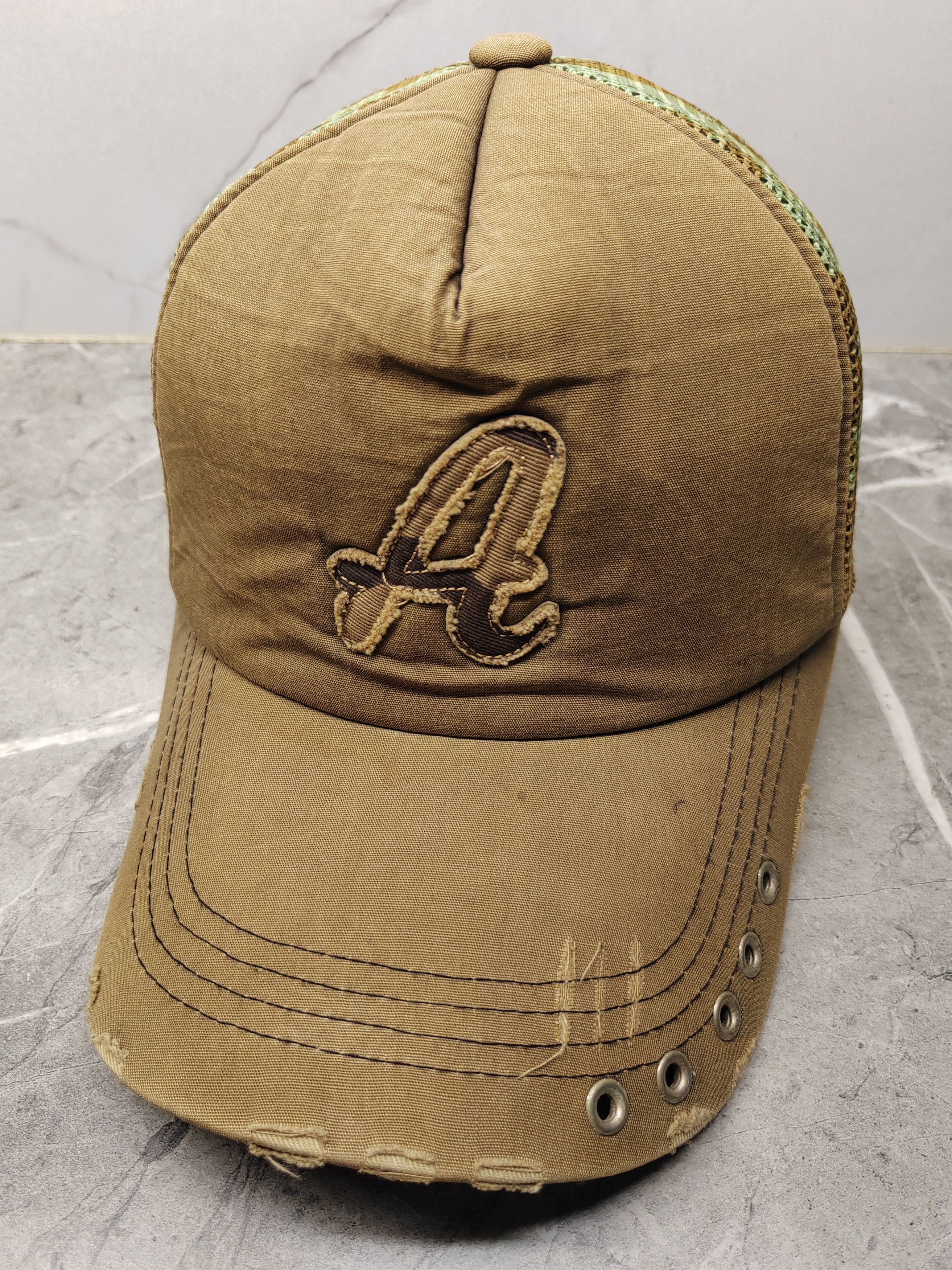 image of Vintage Logo A Distressed Style Trucker Cap Hat in Mix, Men's