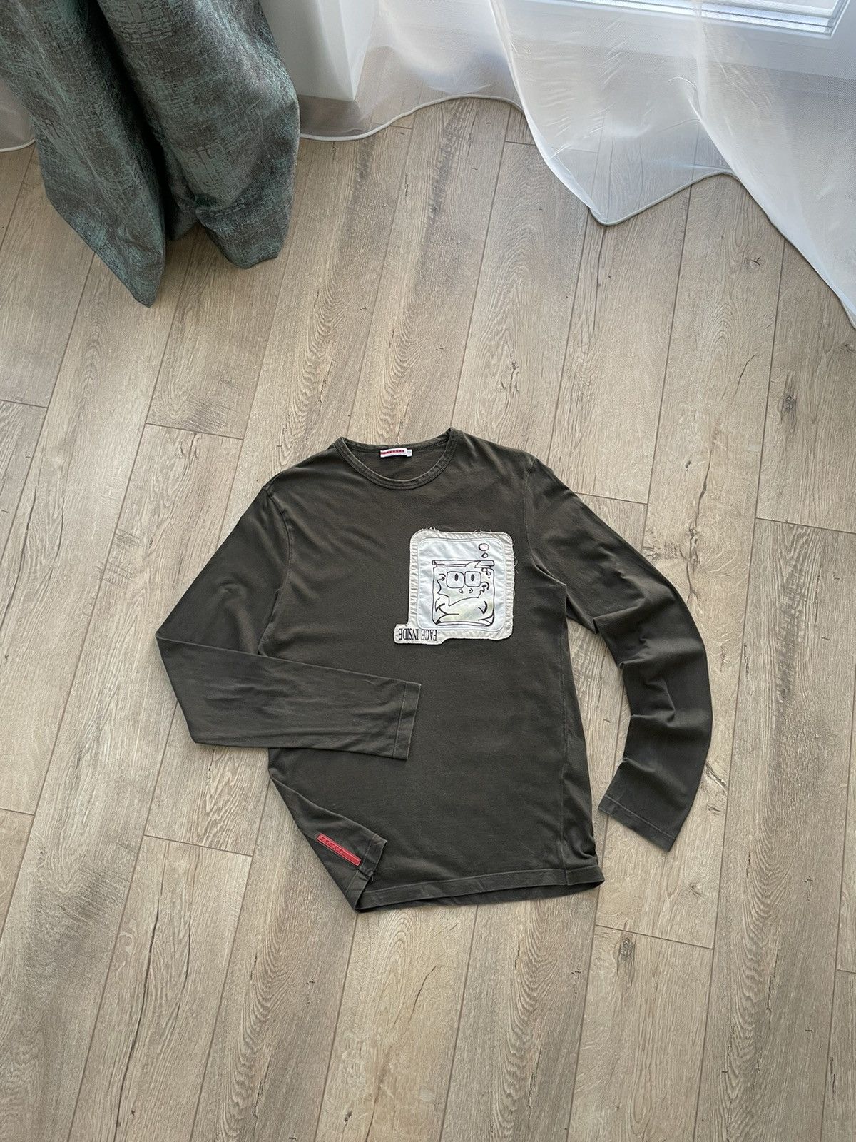 image of Avant Garde x Prada Vintage Prada Face Inside Big Logo Red Tab Longsleeve Size S in Olive, Men's