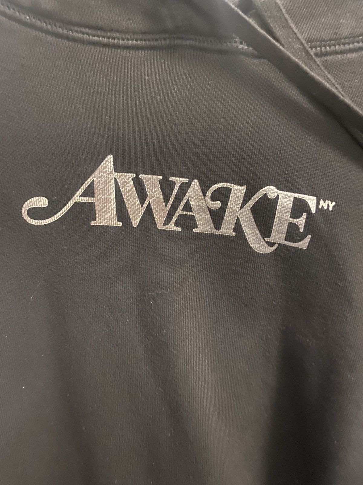 Awake metallic foil logo