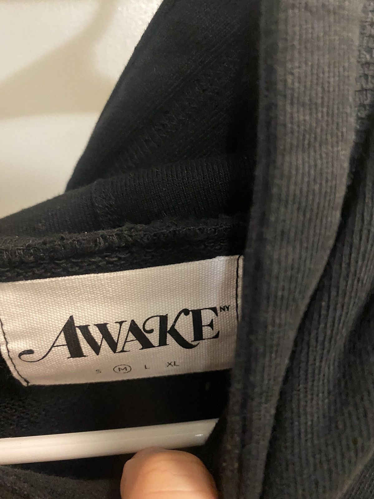 Awake metallic foil logo