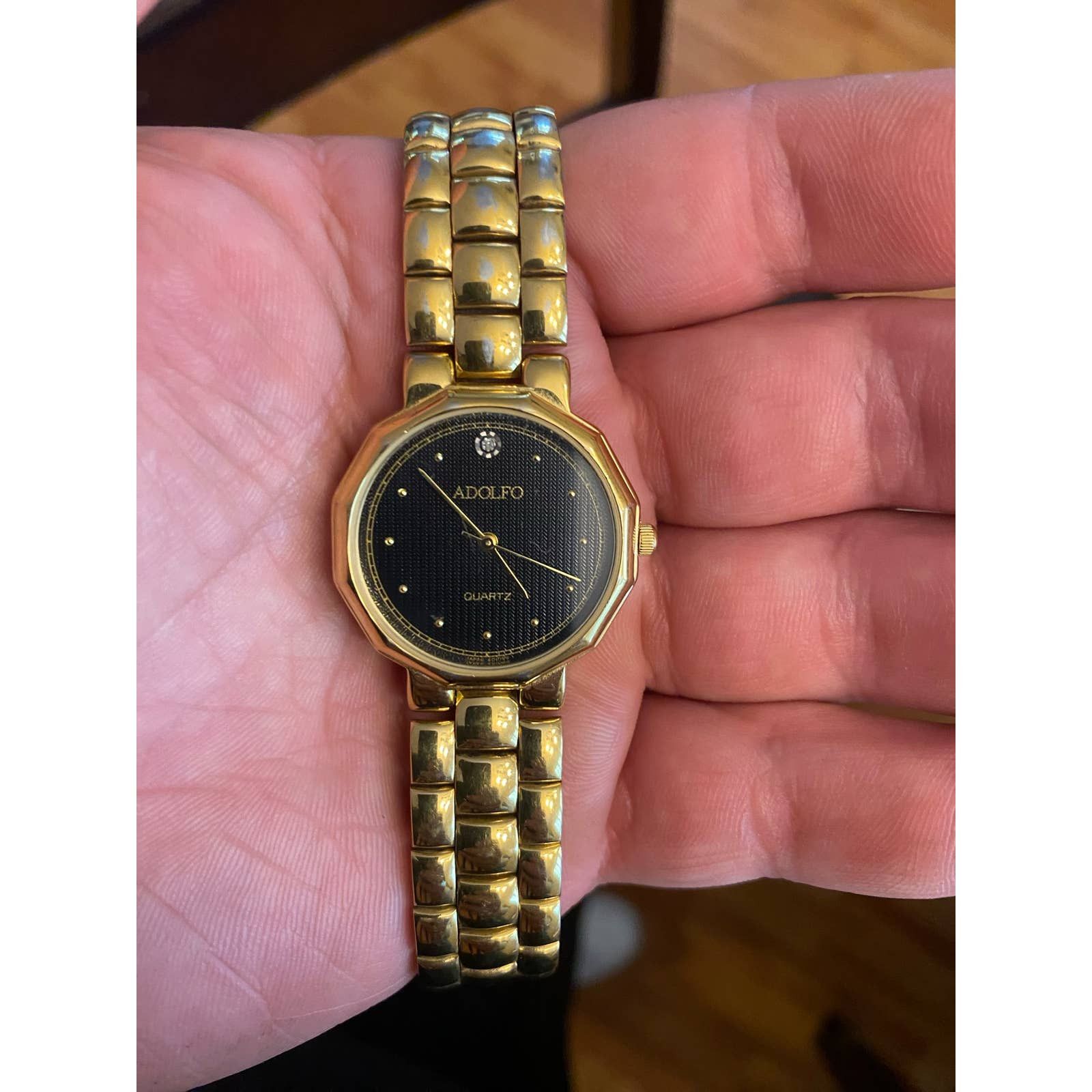 Adolfo quartz hotsell gold watch