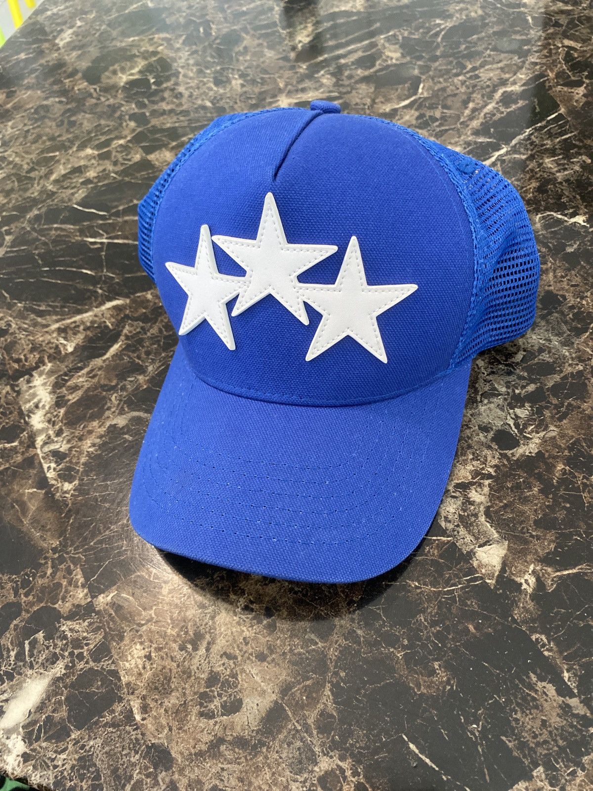 Amiri Three Star Trucker Hat in Black & Carolina Blue