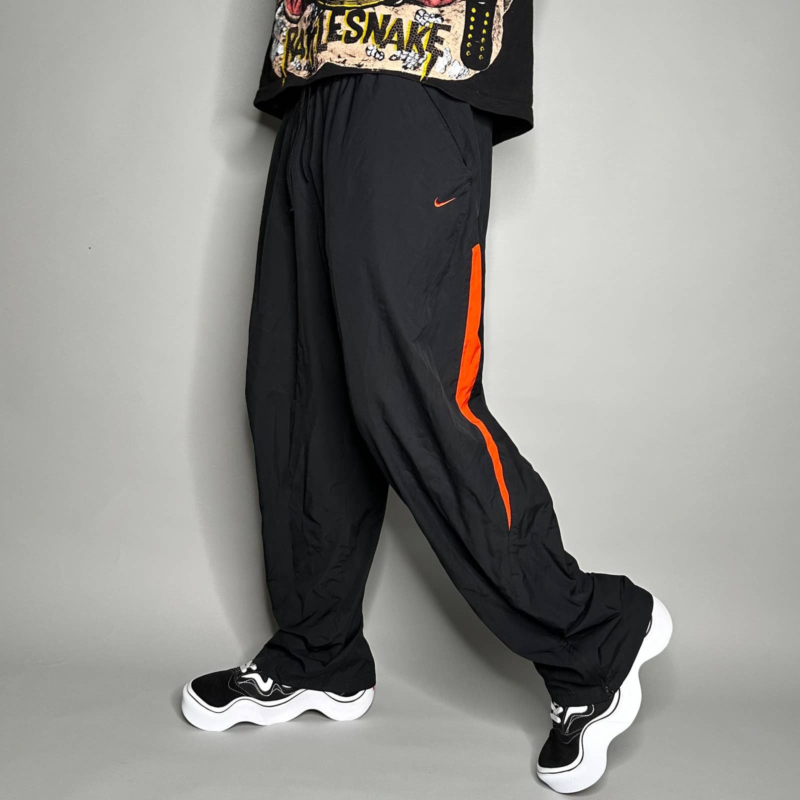 Black and orange nike sweatpants hotsell