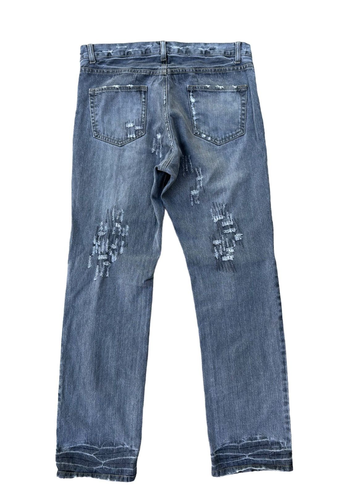 Uniqlo distressed style denim jeans