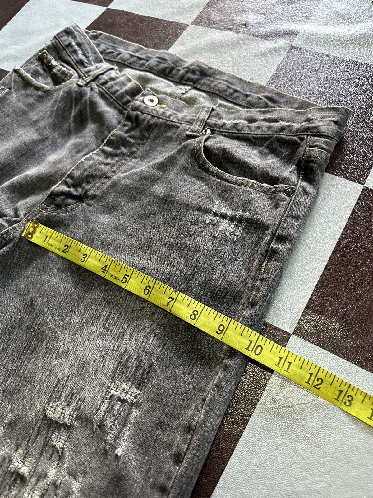 Uniqlo distressed style denim jeans