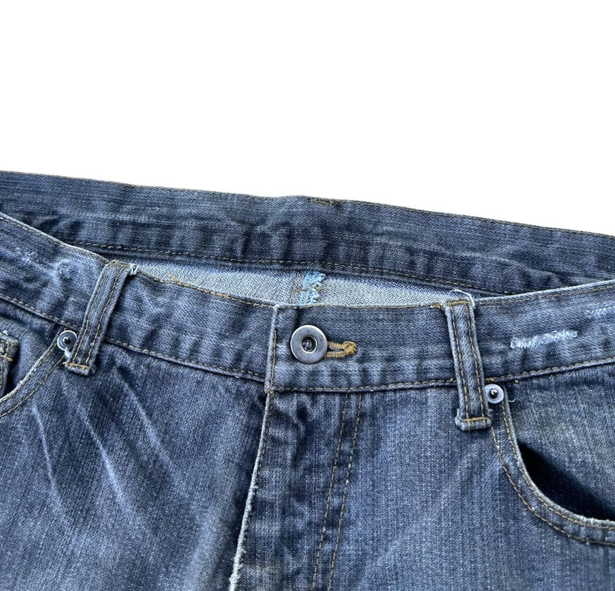 Uniqlo distressed style denim jeans