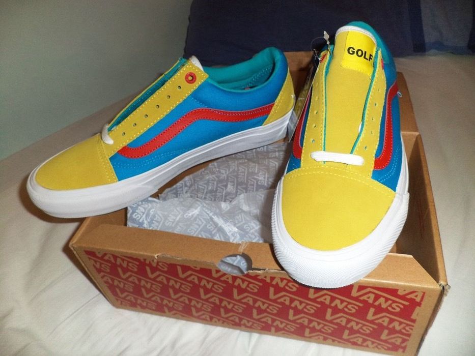 Blue yellow store and red vans