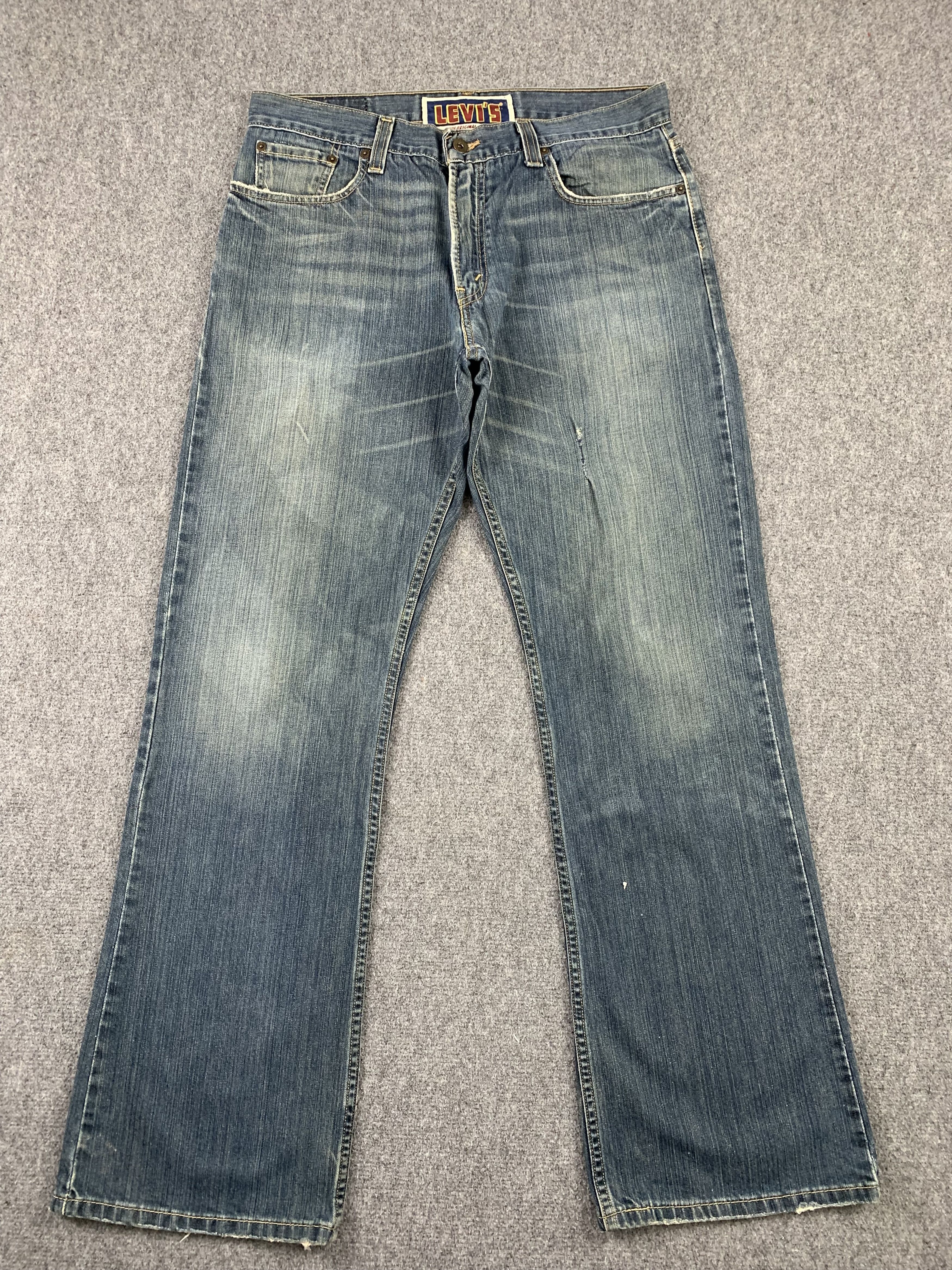 image of Levis 527 Low Bootcut Jeans in Blue Denim, Men's (Size 32)