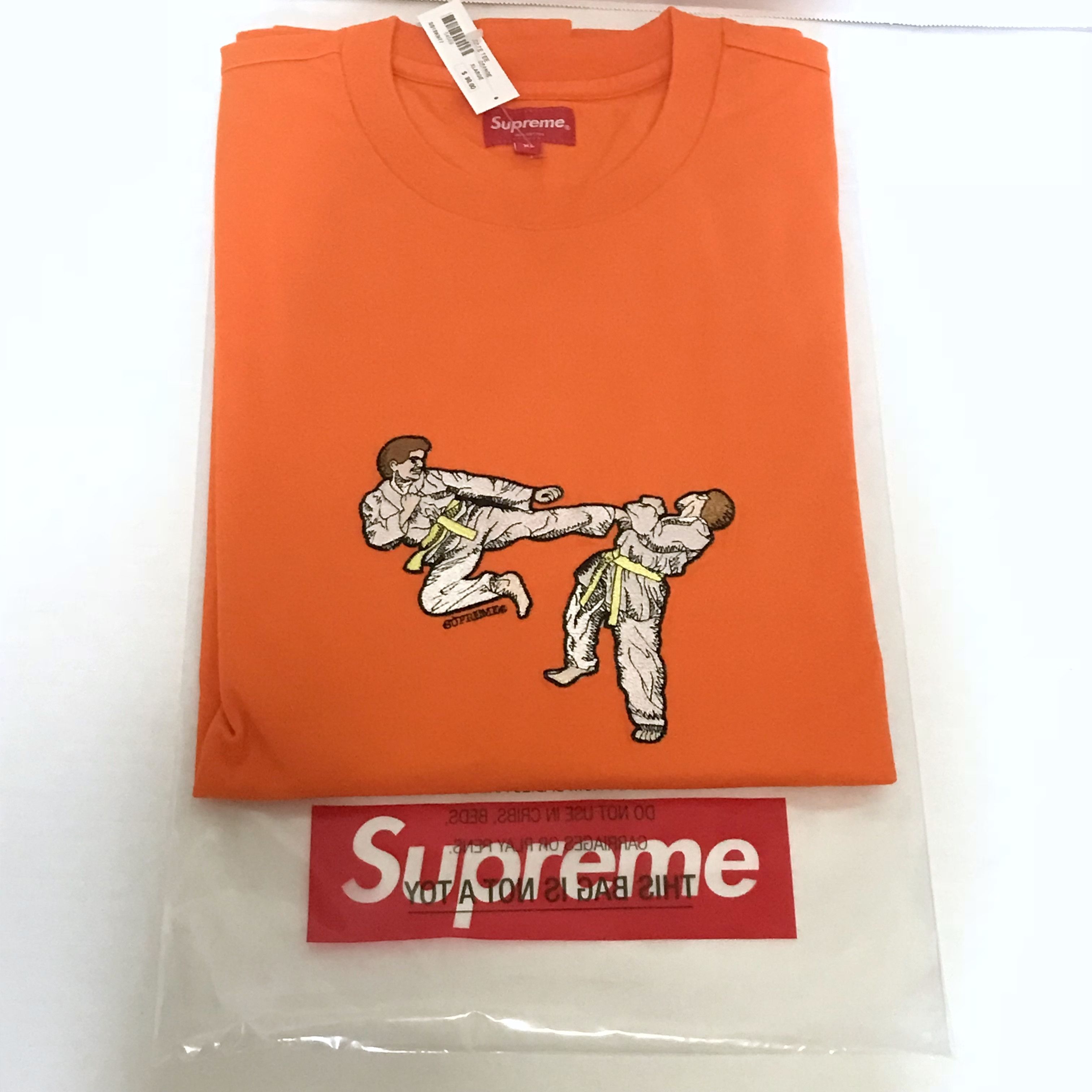 Supreme faces tee orange online