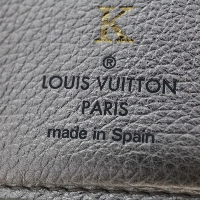 LOUIS VUITTON Louis Vuitton Taurillon LV Initial Portefeuil