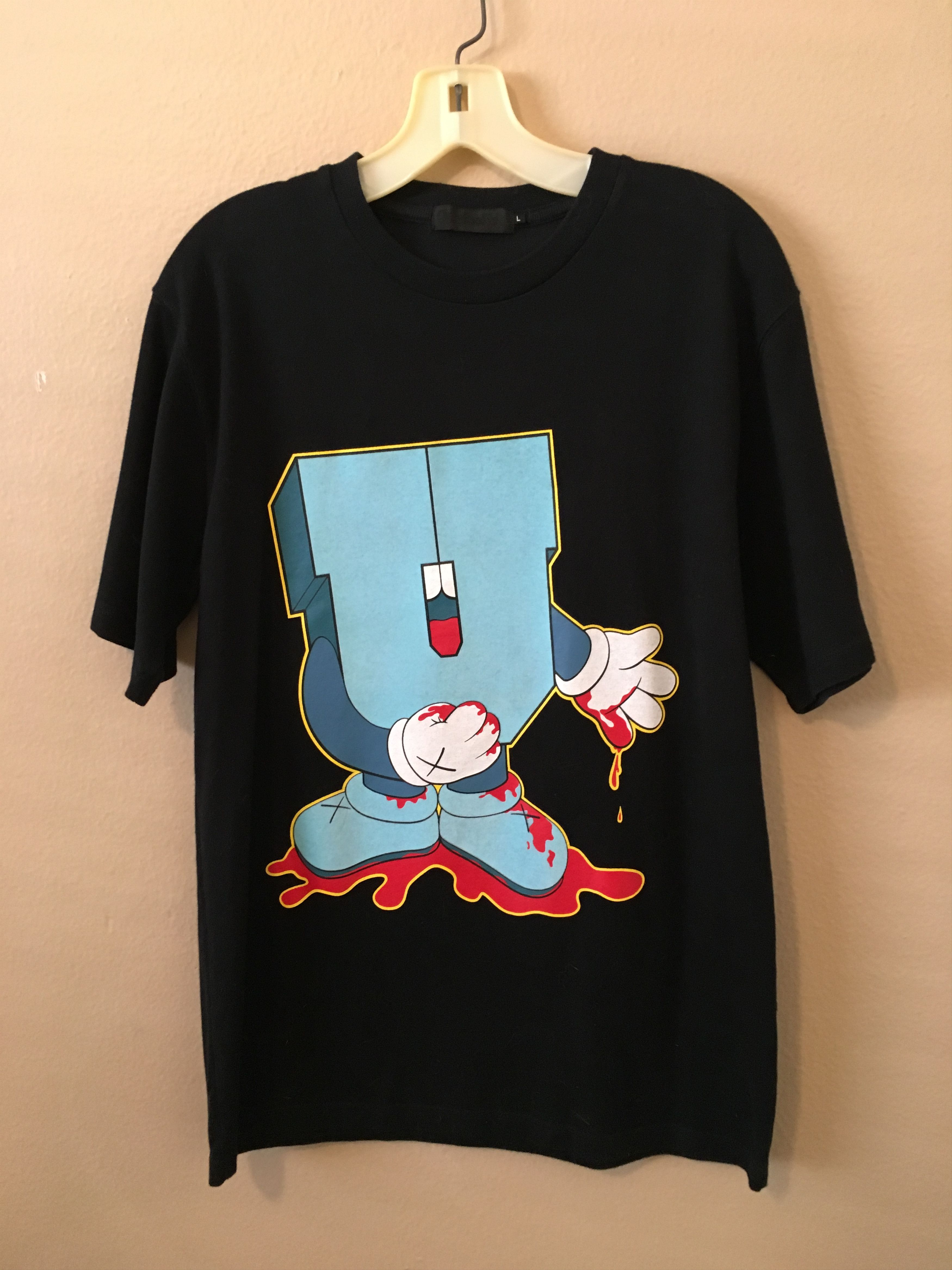 Original Fake OriginalFake Kaws x Undefeated Kaws T-Shirt | Grailed