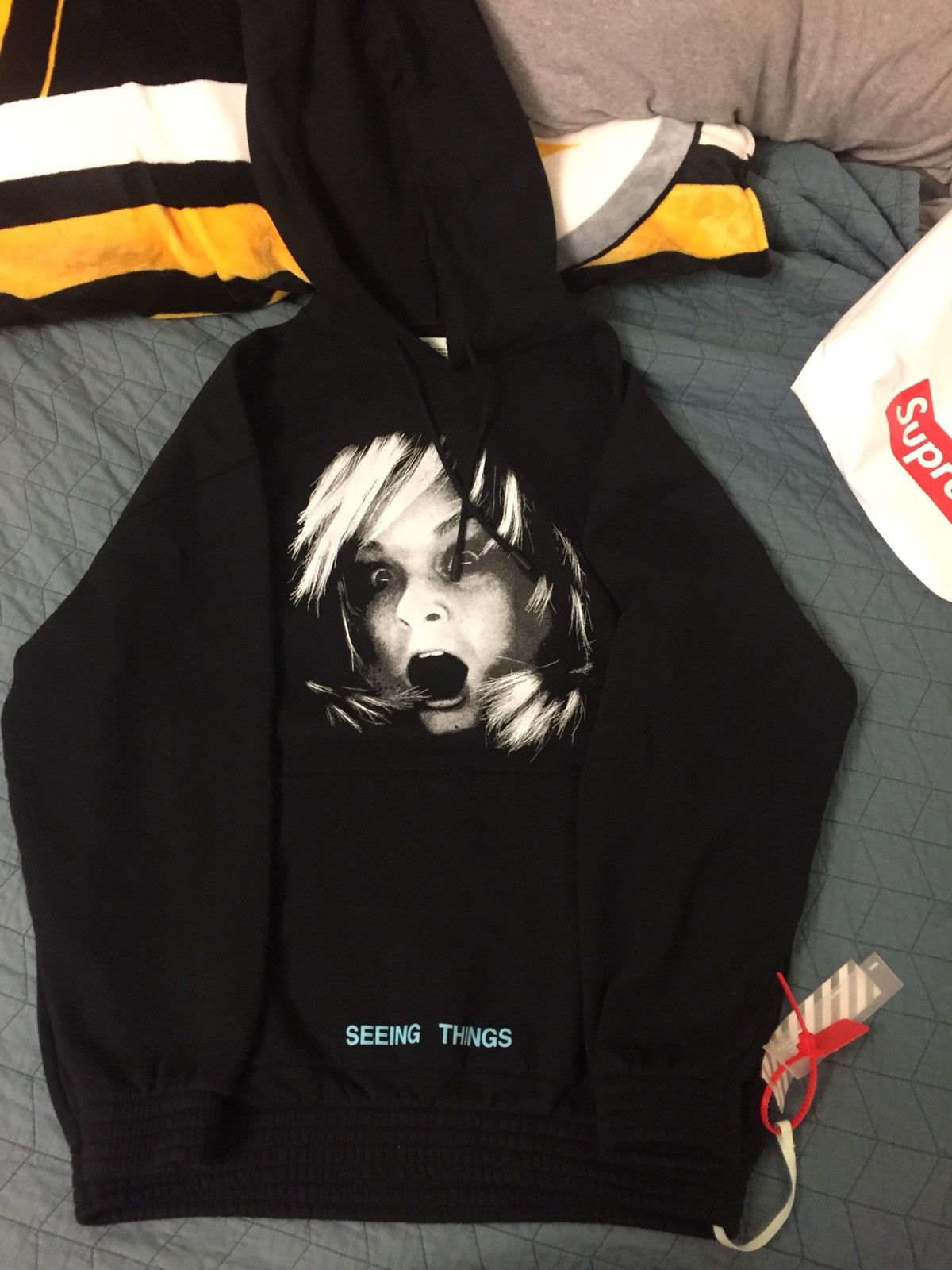 Screaming girl off store white hoodie