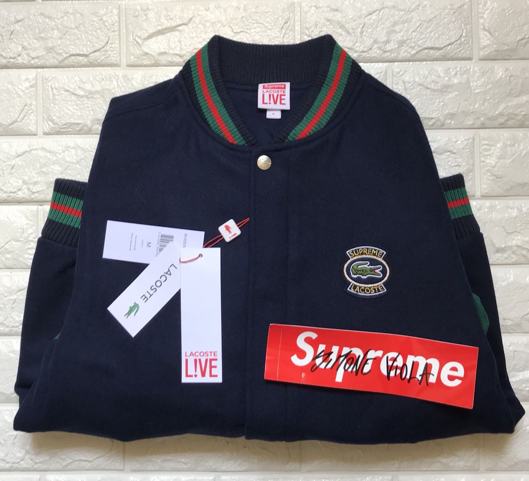 Supreme lacoste clearance varsity jacket