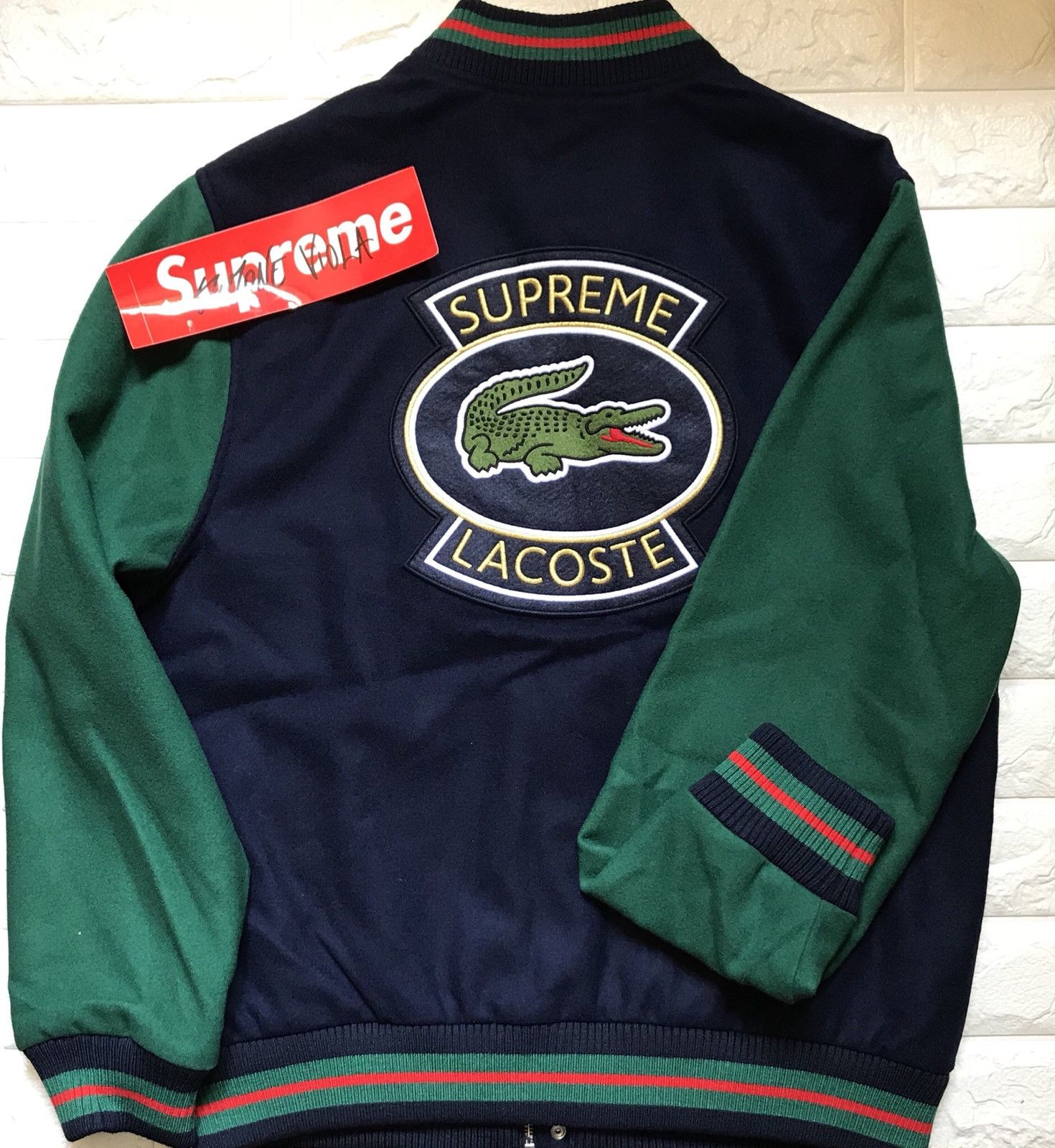 Supreme x lacoste varsity hot sale jacket