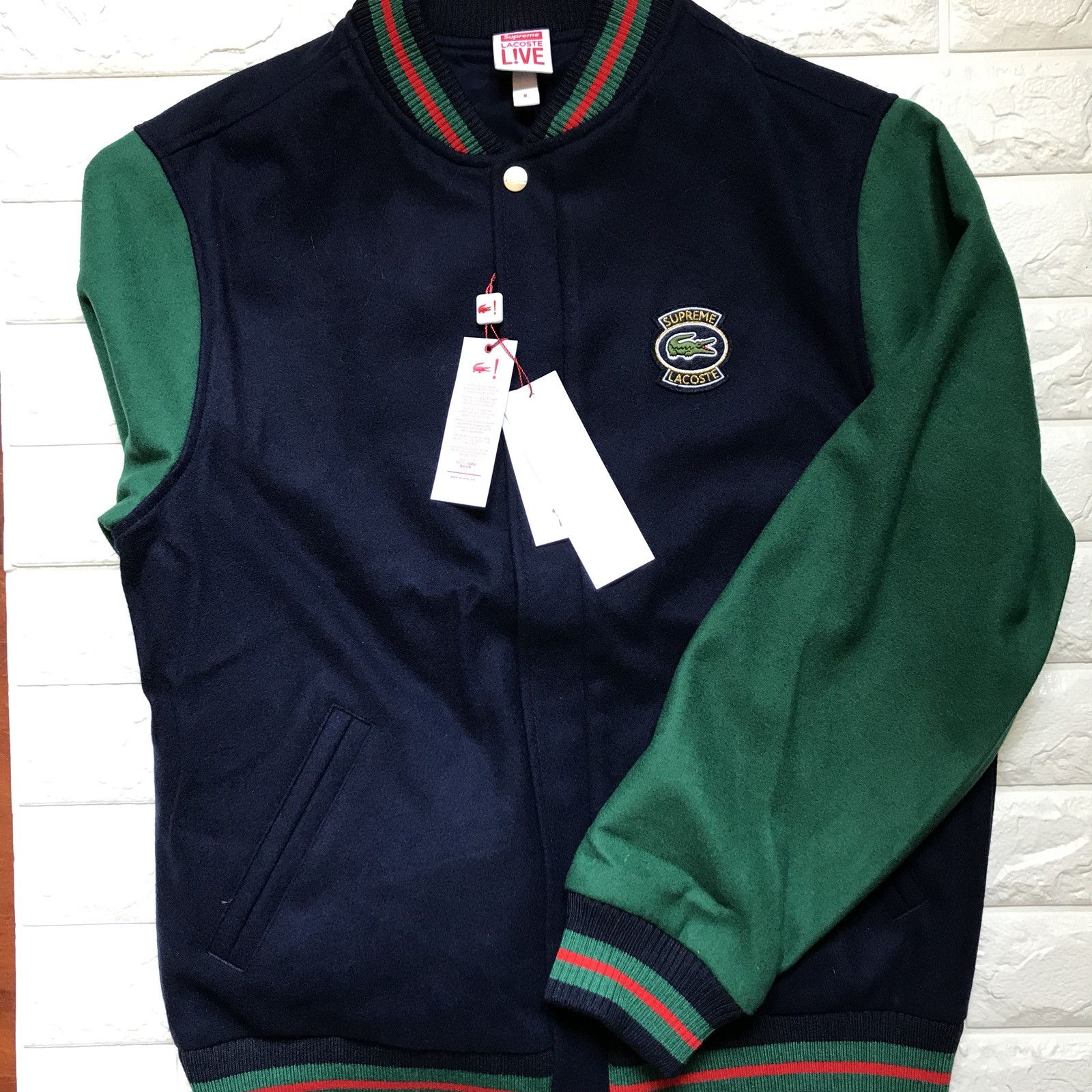 Lacoste supreme outlet varsity jacket