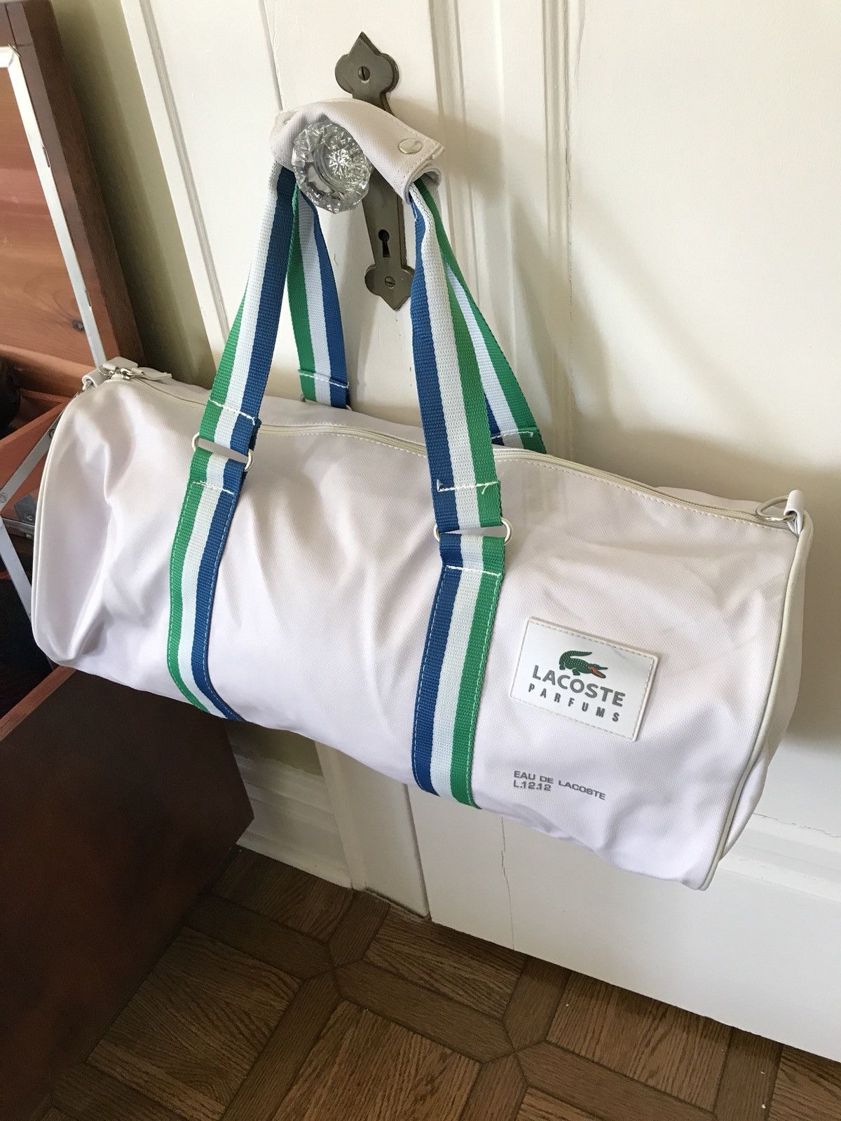 Lacoste white duffle bag best sale