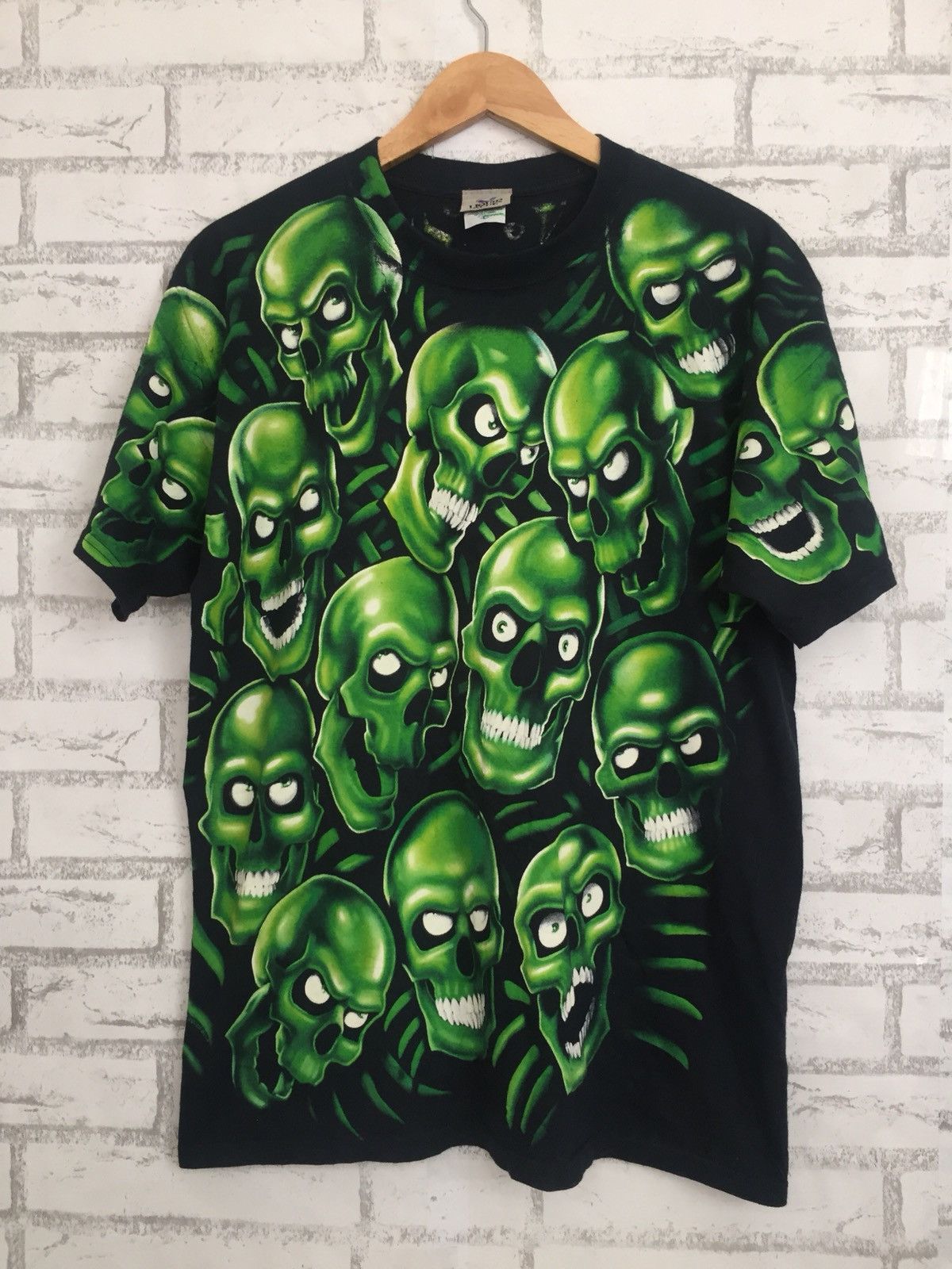 Supreme green skull outlet t shirt