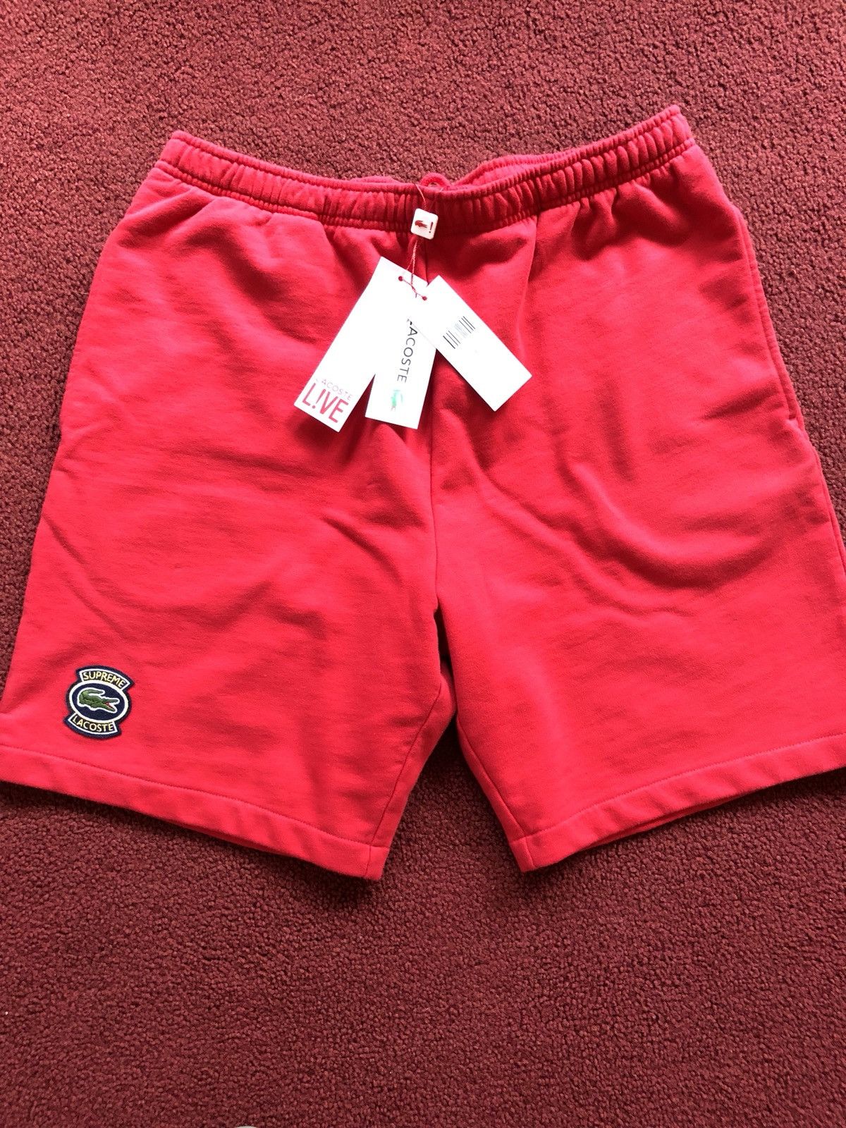 Supreme LACOSTE Logo Panel Sweatshort (FW19) - $128