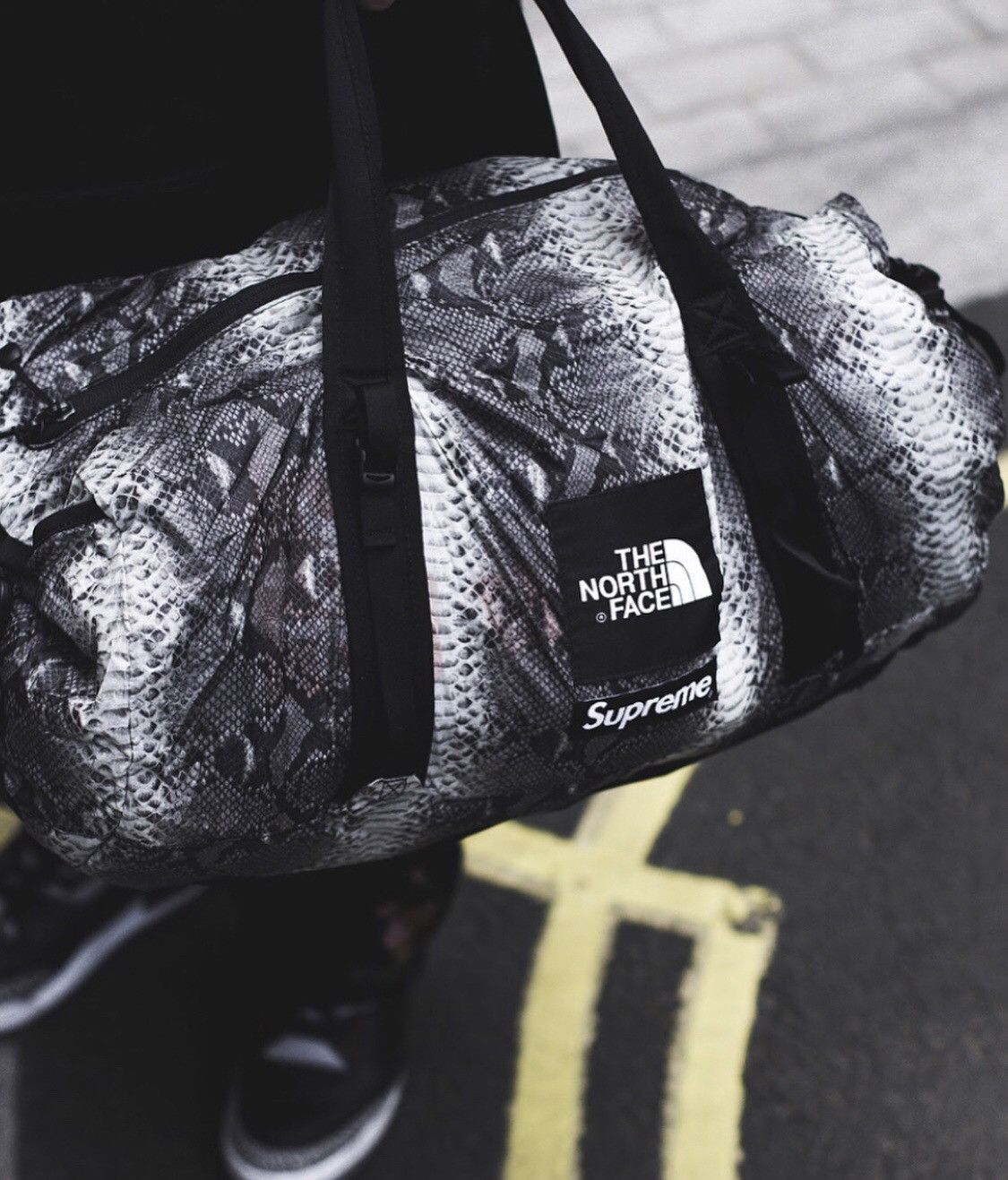 Supreme north face store snakeskin duffle bag