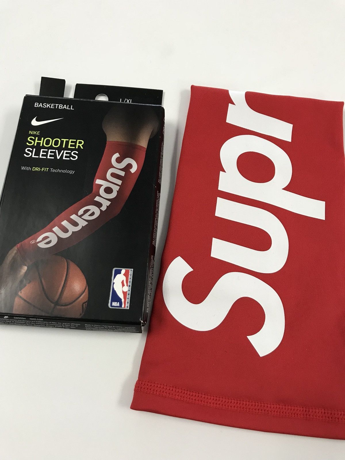 Supreme shooting sleeve outlet fake