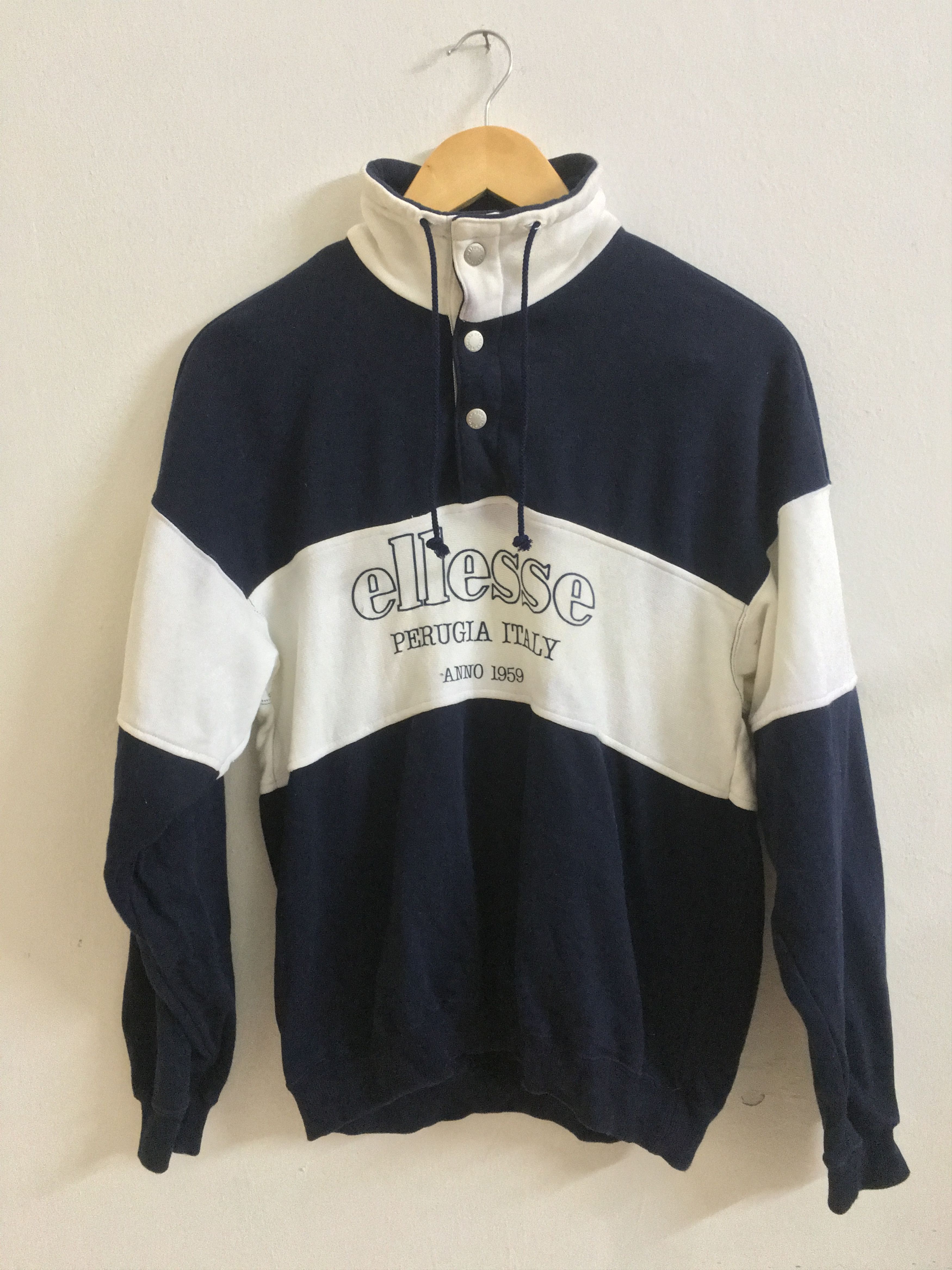 image of Vintage Ellesse Sweatshirt Spell Out Armpit 19"x 25" in White, Men's (Size Medium)