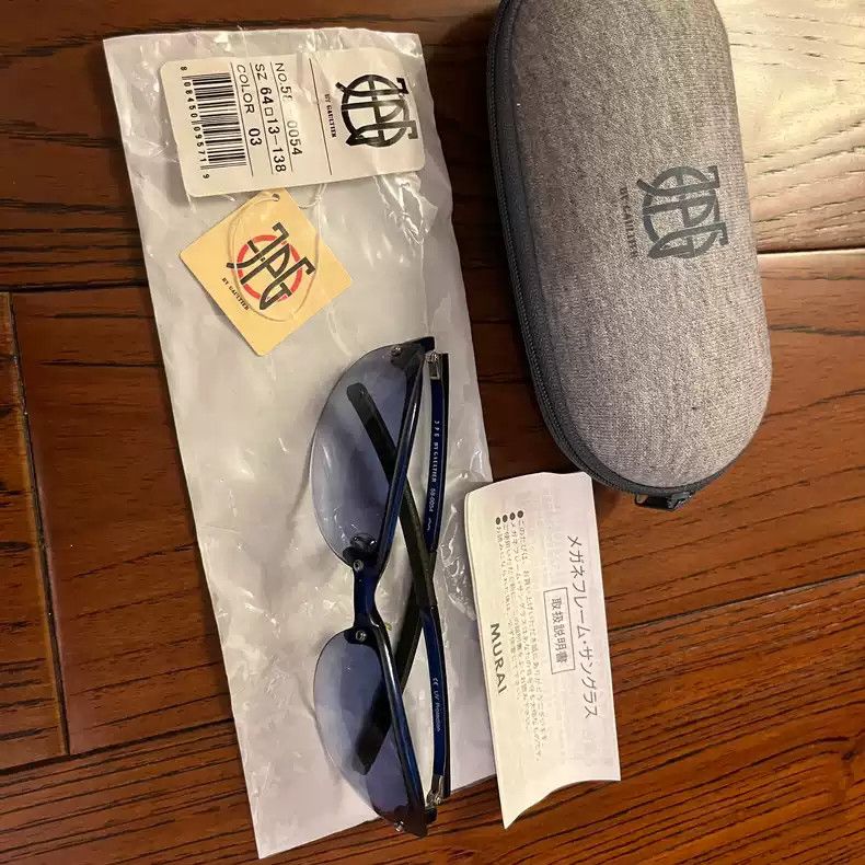 Jean Paul Gaultier Blue sunglasses.