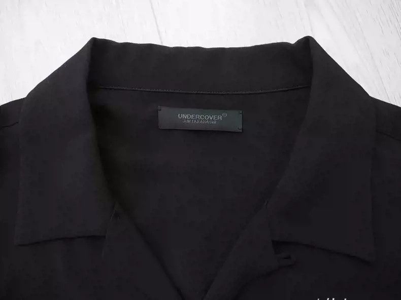 Undercover Black slogan shirt
