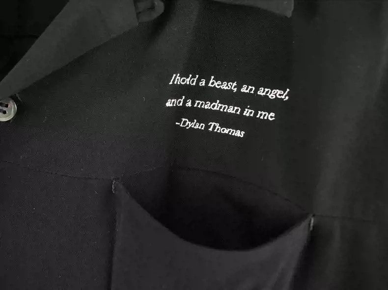 Undercover Black slogan shirt