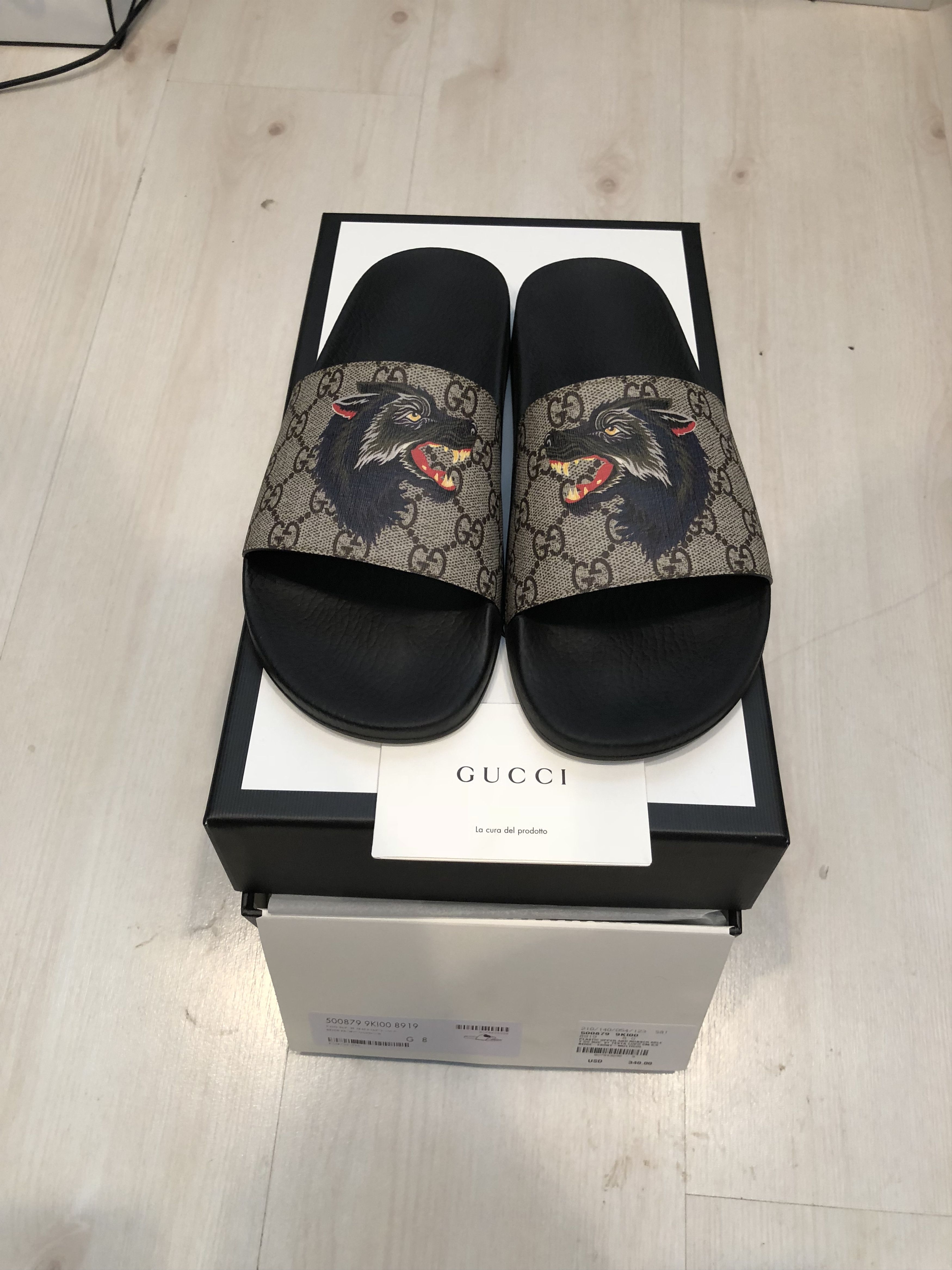 Gucci wolf slides hot sale