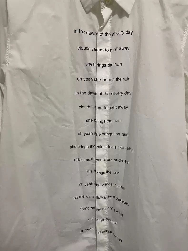 Undercover 12SS She brings the rain slogan shirt