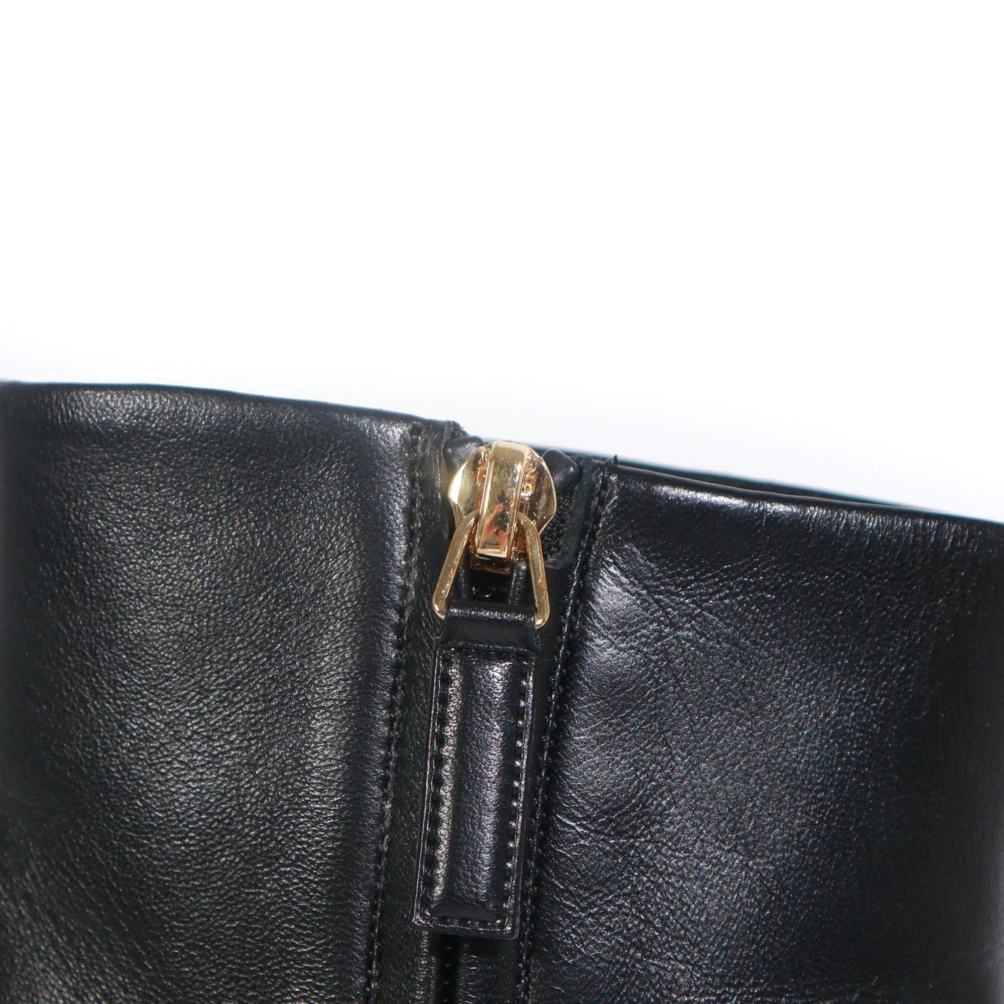 CHANEL - Black leather wedge ankle boots (T39)