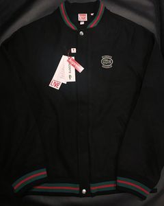 Lacoste supreme hot sale varsity jacket