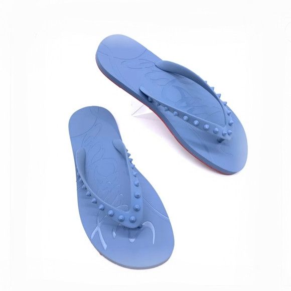 Super Loubi studded rubber flip flops in blue