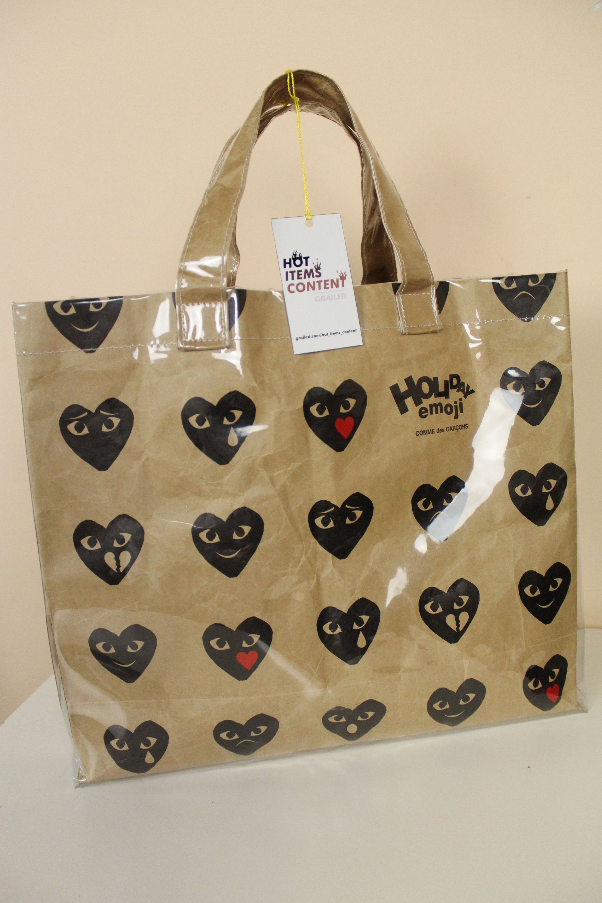 Comme Des Garcons Play × Comme des Garcons Comme des Garçons Play Holiday  Emoji Paper/PVC Tote Bag | Grailed