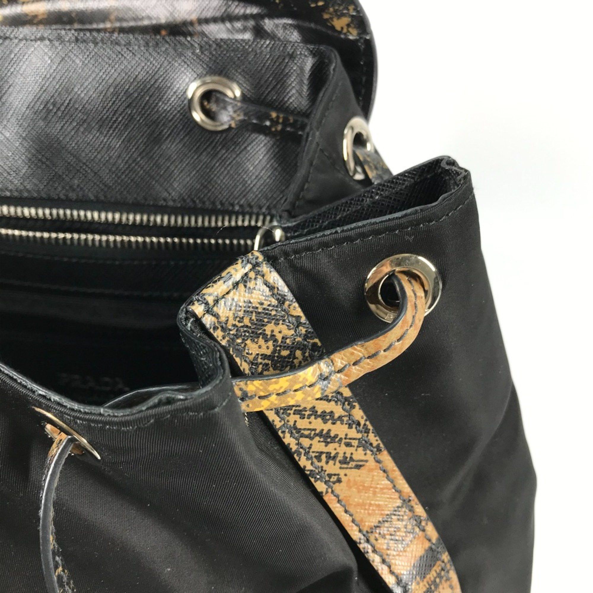 Prada PRADA 1BZ038 triangle logo triangle logo plate backpack bag drawstring bag Backpack Black BeigeBased Size ONE SIZE - 14 Thumbnail