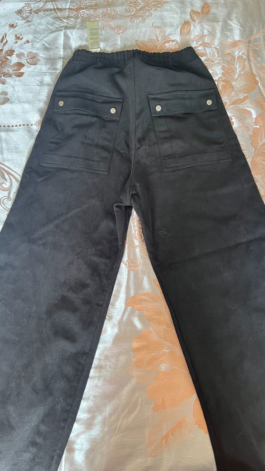 Rick Owens Black baggy trousers with drape.