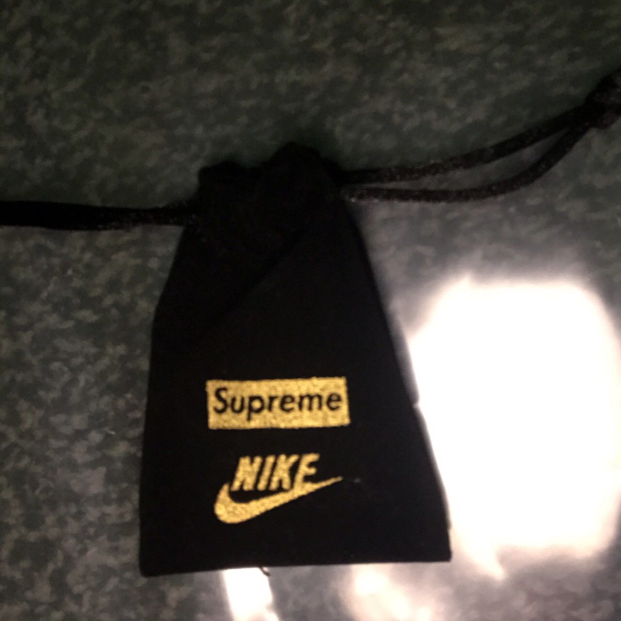 Supreme nike outlet earrings