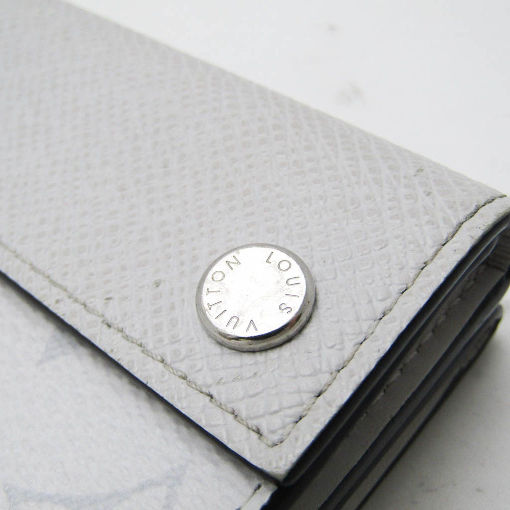 Louis Vuitton Louis Vuitton Taiga Llama Discovery Compact Wallet M67621 Men's Taiga Leather,Monogram Wallet (tri-fold) Blanc Size ONE SIZE - 7 Thumbnail