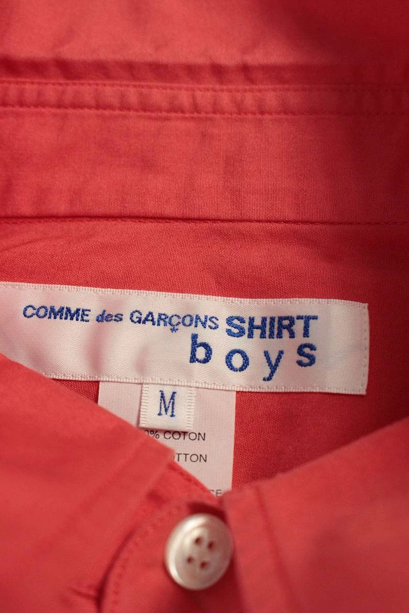 Comme des garcons slogan online