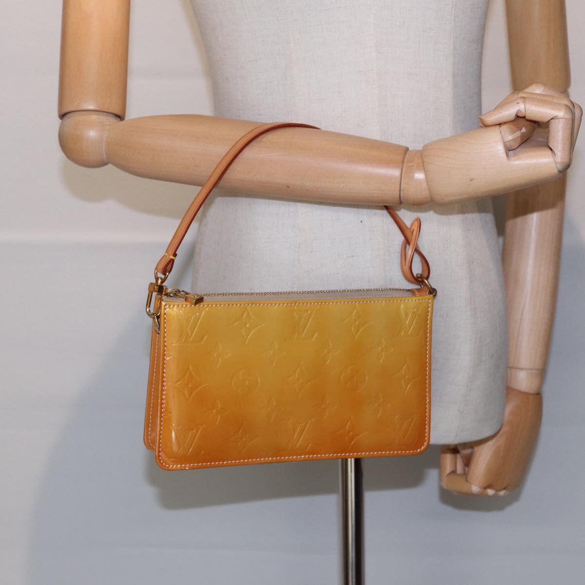 Louis Vuitton Lexington Beige Patent Leather Clutch Bag (Pre-Owned) Size ONE SIZE - 16 Thumbnail