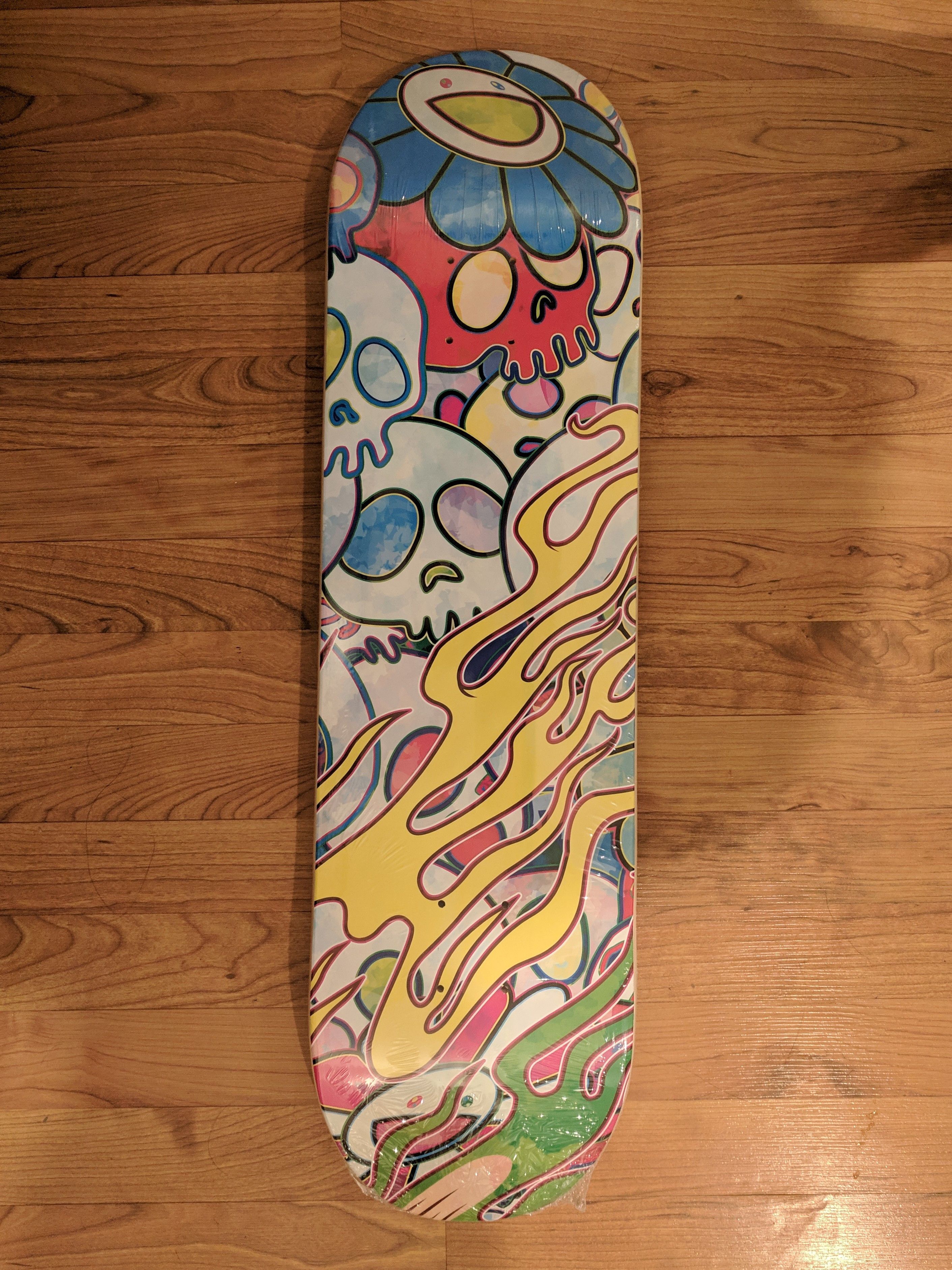 TAKASHI MURAKAMI X COMPLEXCON FLAMING SKULLS SKATEBOARD DECK