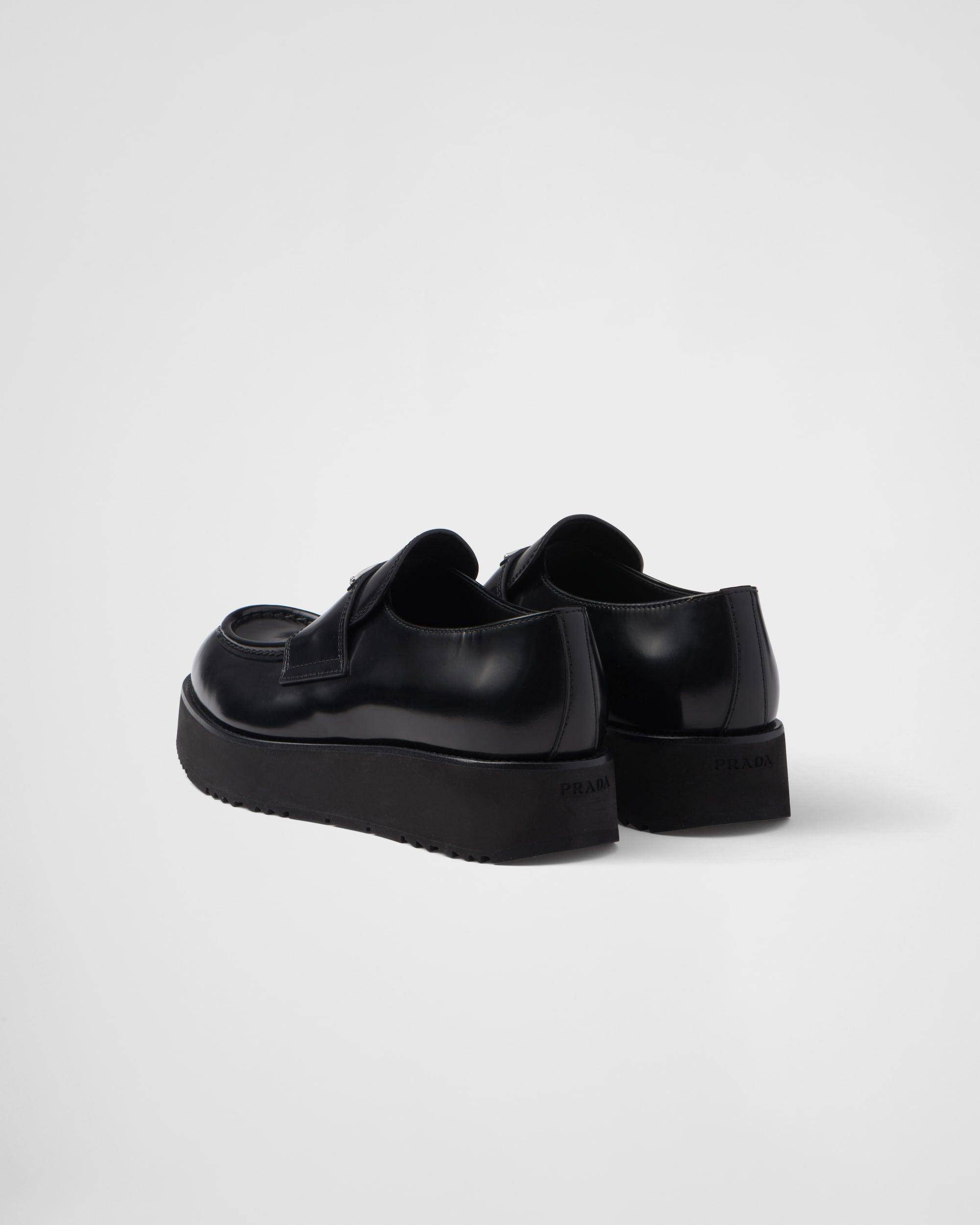 Brushed leather loafers with logo