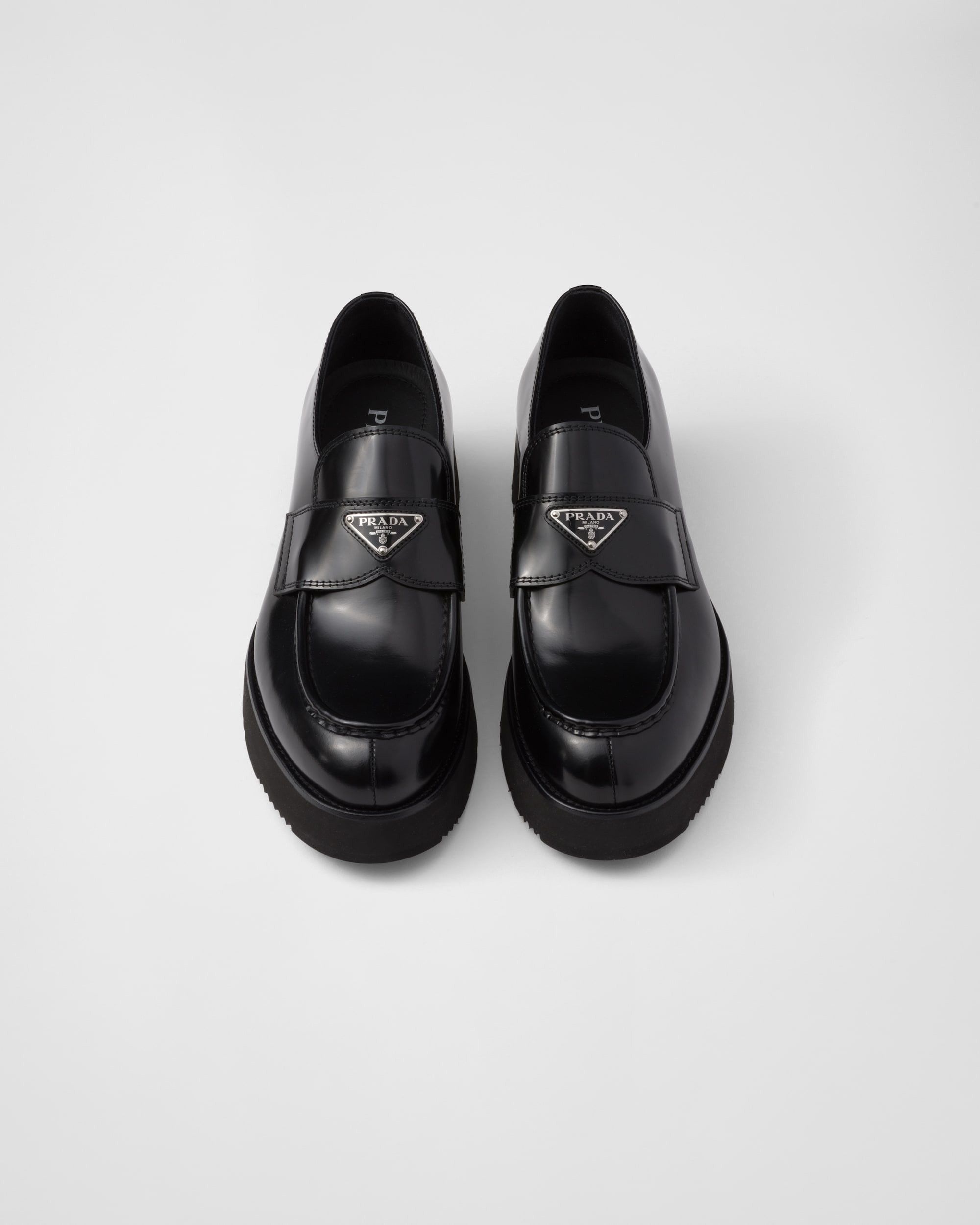 Brushed leather loafers with logo