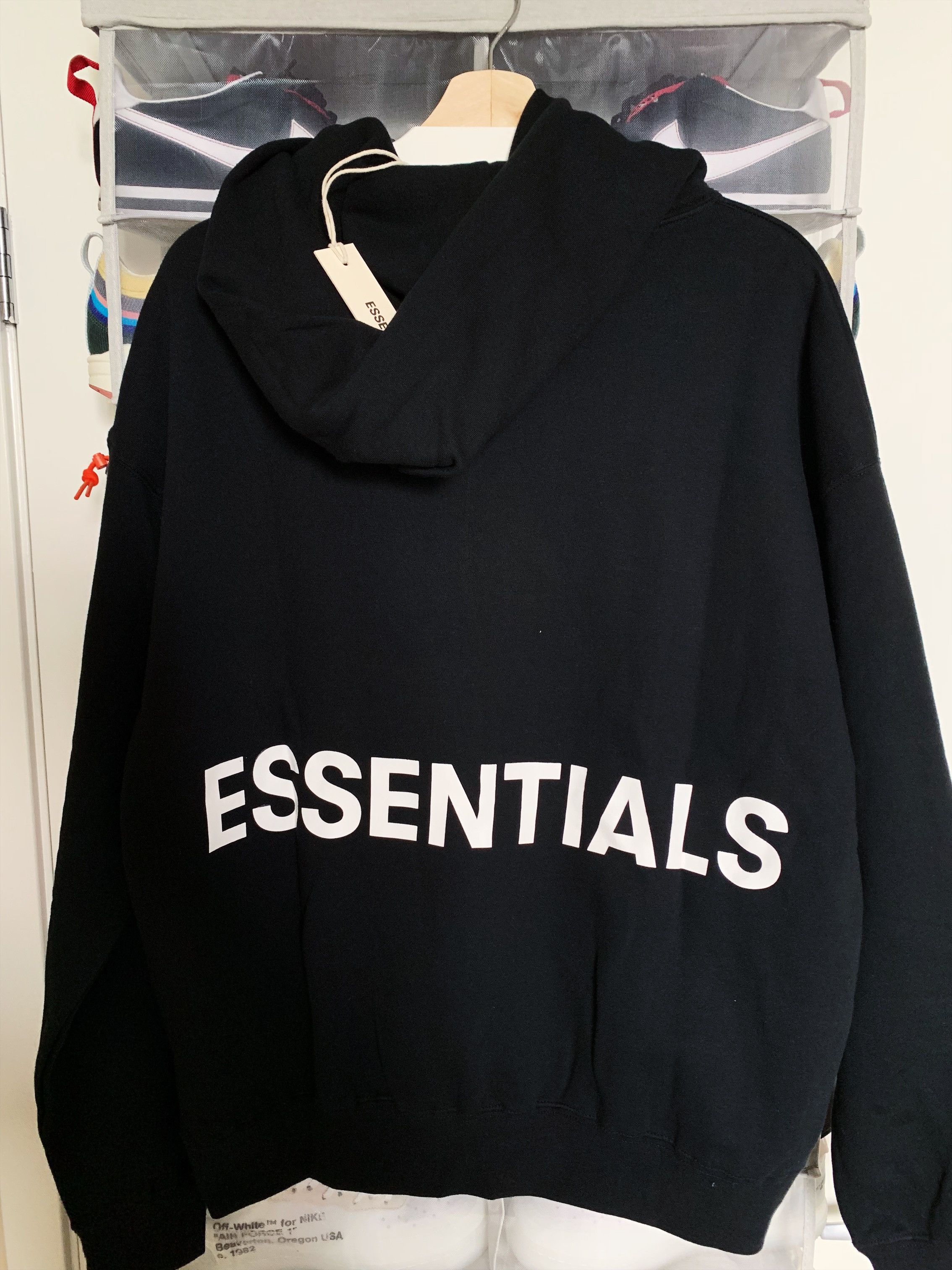 FOG Fear of God Essentials Graphic Pullover Hoodie Black | Grailed