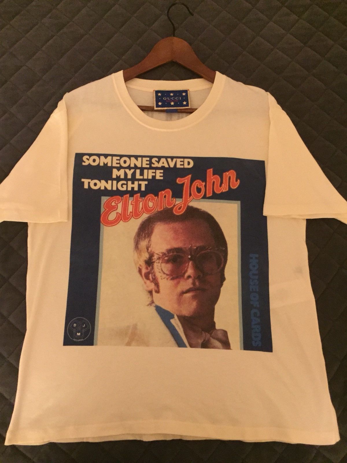 Elton john gucci t shirt deals