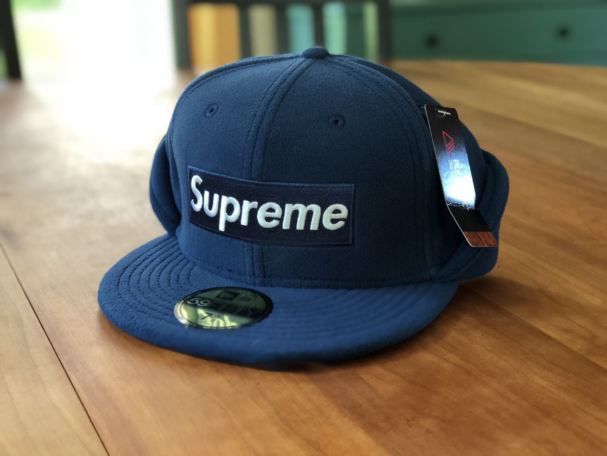 SUPREME NEW ERA EAR FLAP NAVY HAT